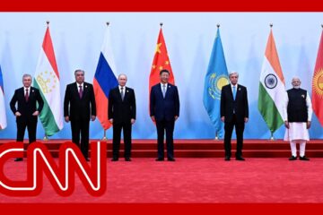 Xi and Putin stand shoulder to shoulder as China casts itself an alternative global leader
